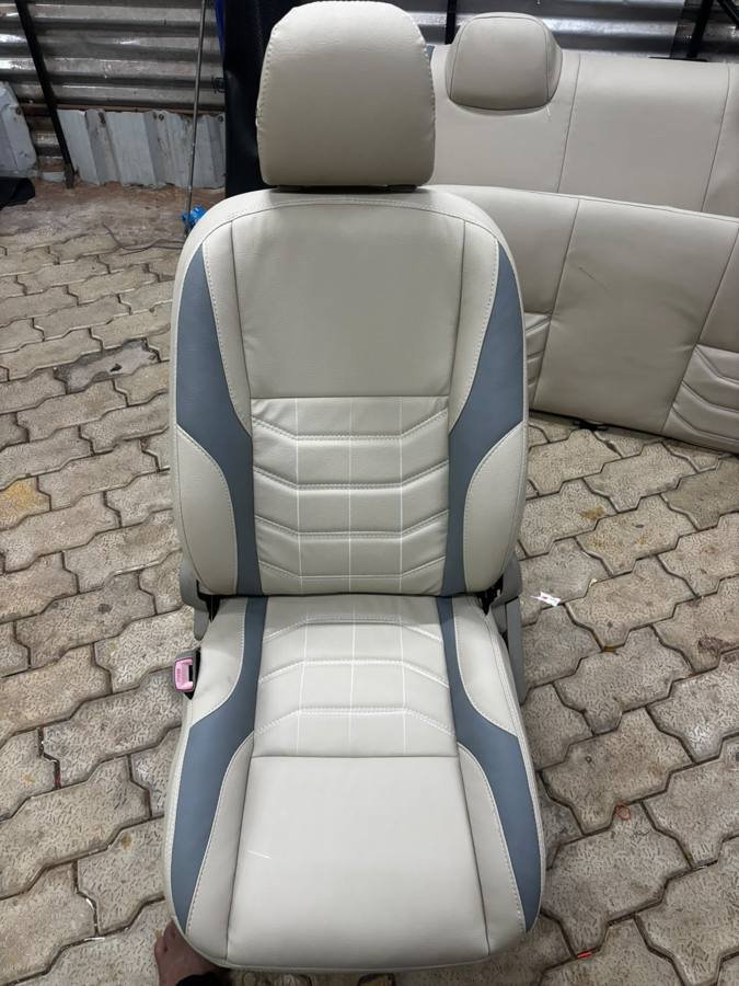 Cream and grey leatherette seat