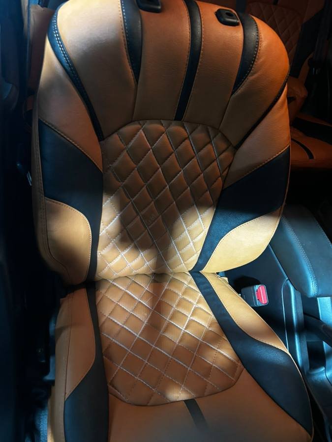 Tan and black designer seat covers