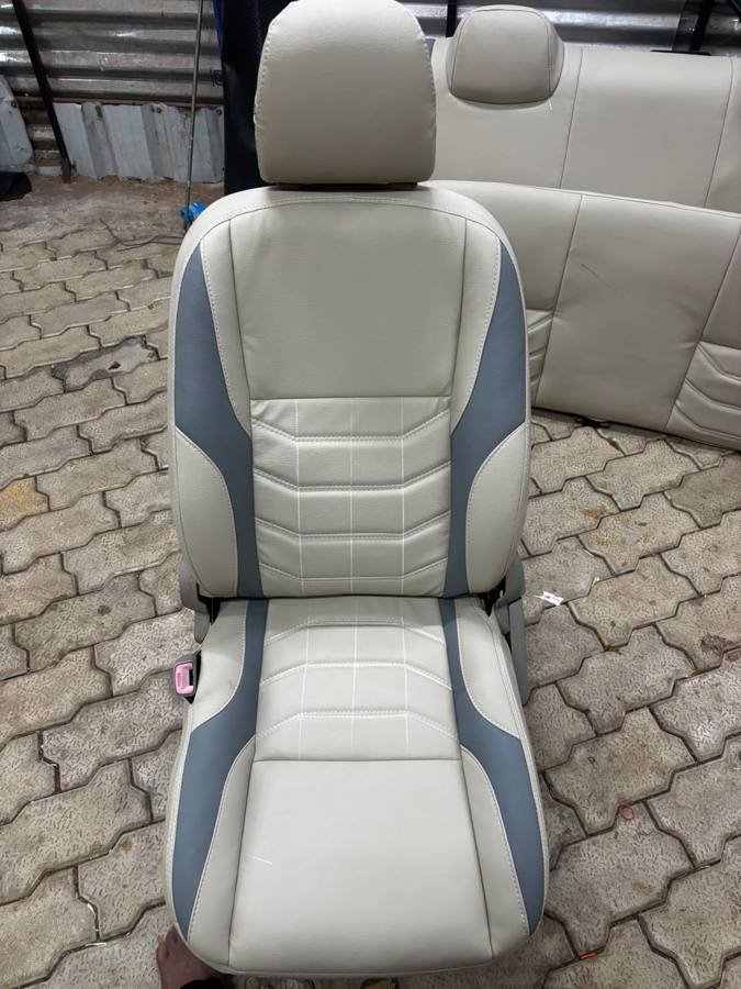 Cream and grey leatherette seat
